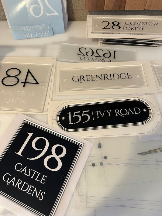 What can I have on my house sign?