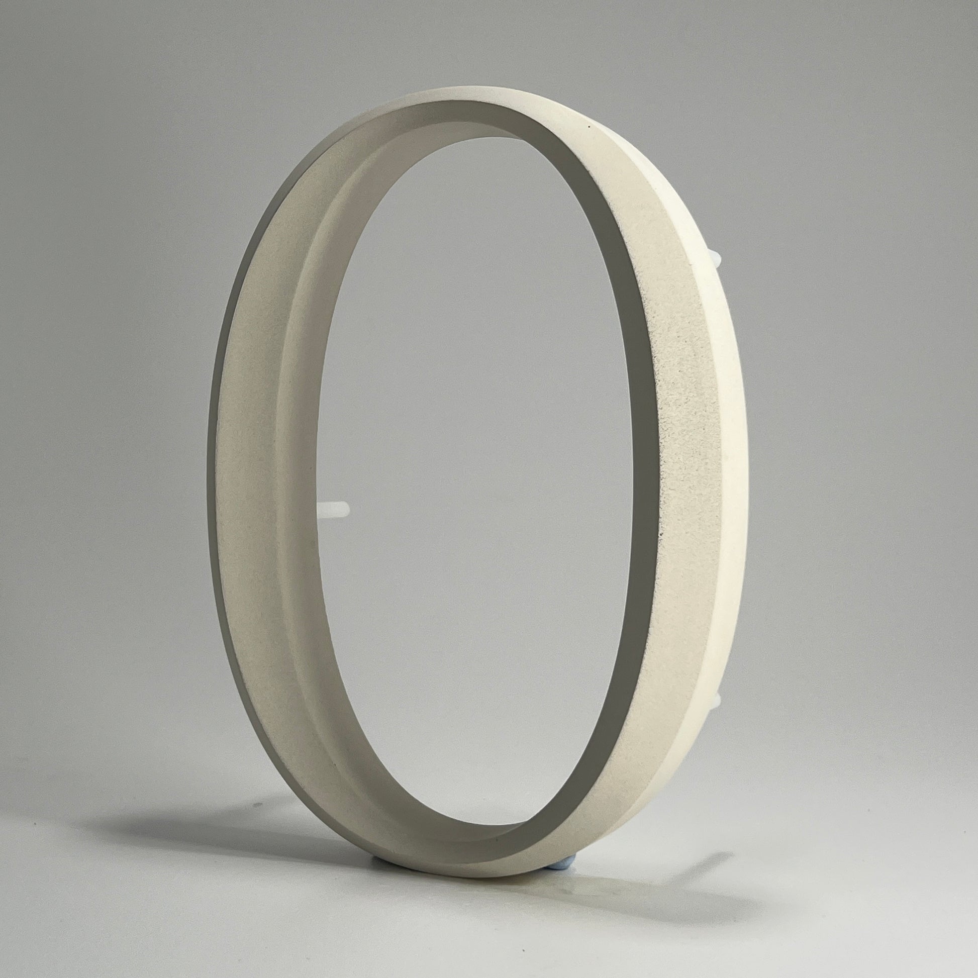 Luxury house number ‘0’, with a floating prismatic design for modern and classical homes alike.