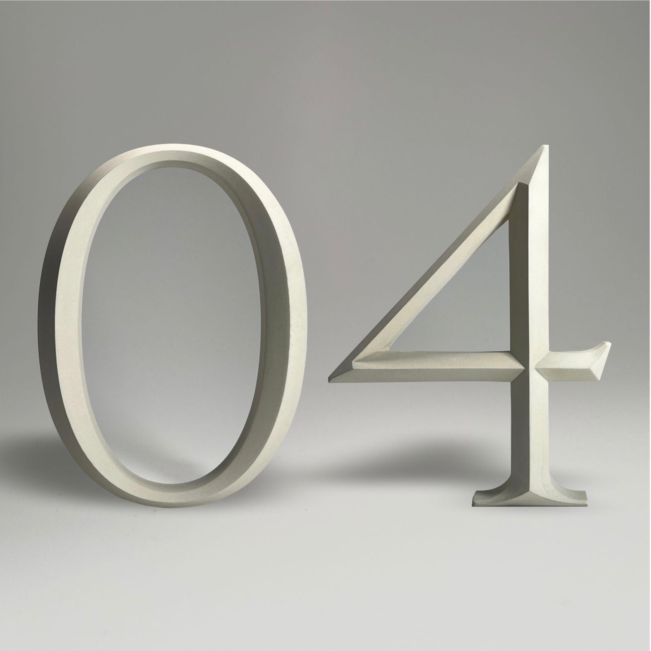 Elegant floating prismatic house number ‘04’, suitable for luxury homes and timeless architectural designs.