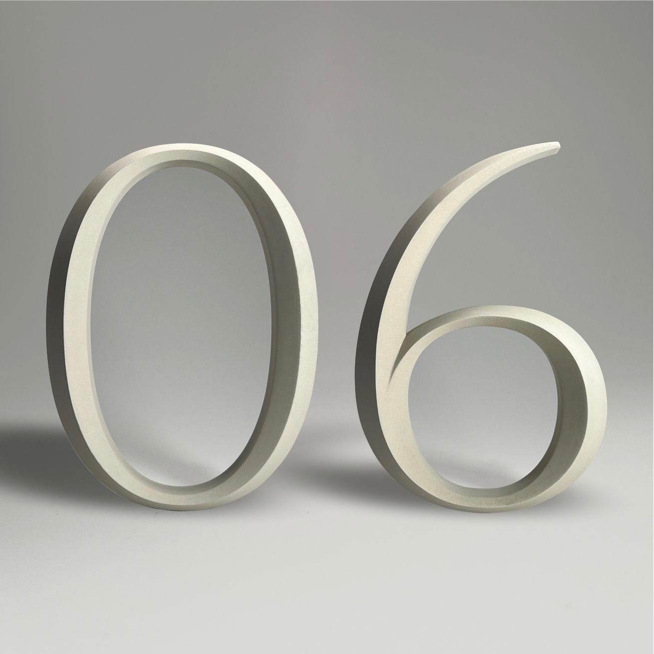 Floating prismatic house number ‘06’ with a sleek design, crafted for elegant homes and modern house signs.