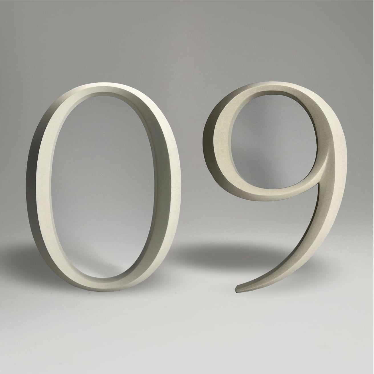 Elegant floating prismatic house number ‘09’, suitable for luxury homes and timeless architectural designs.