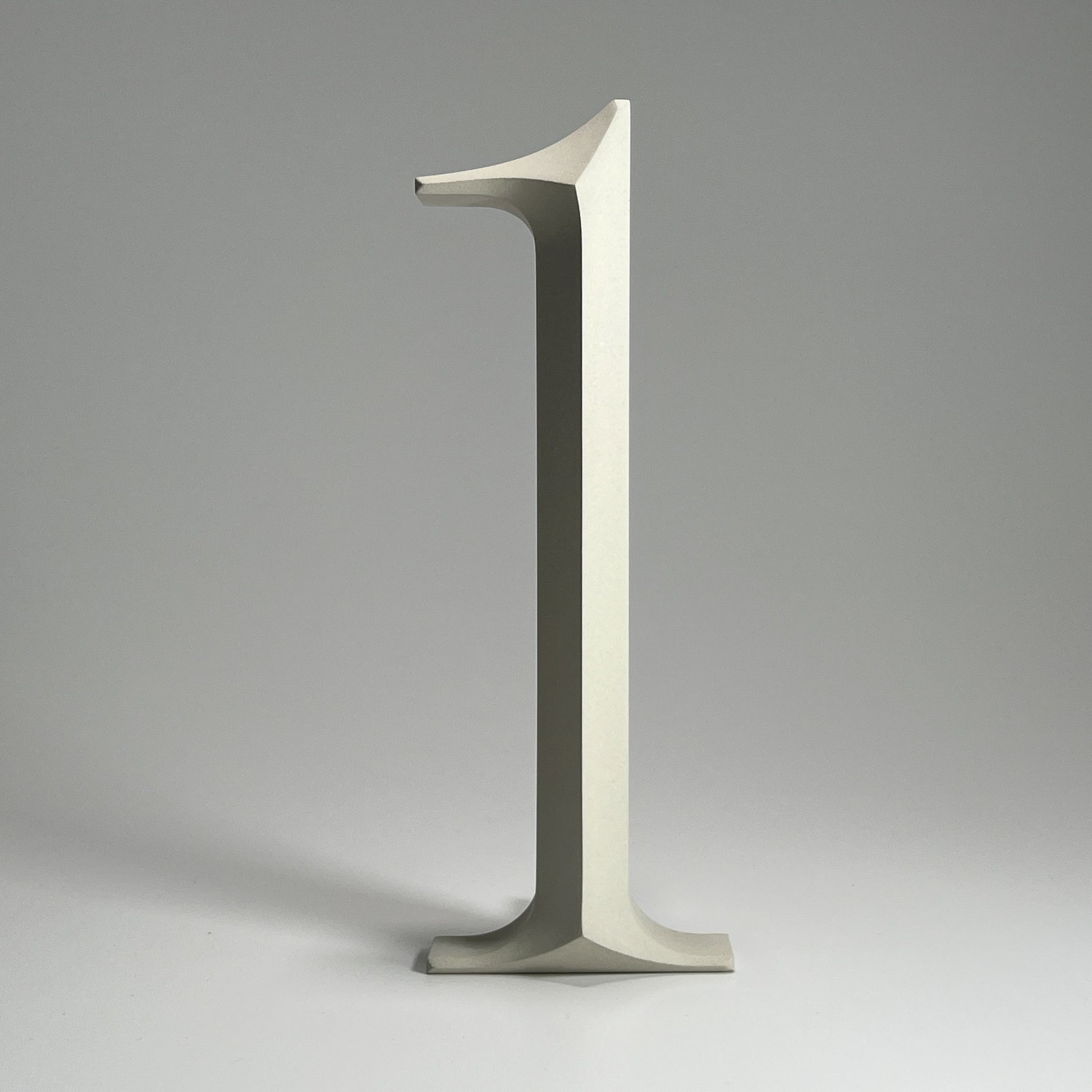 Luxury floating prismatic house number sign ‘1’, ideal for classical houses with timeless appeal.