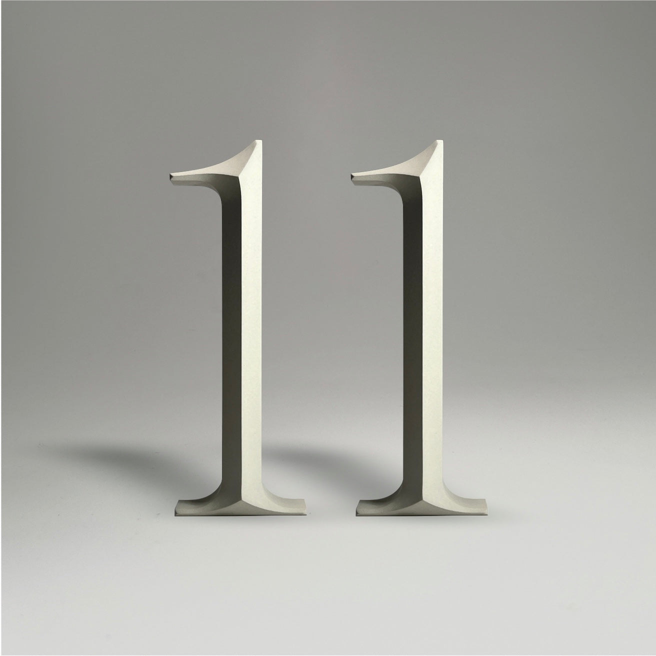 Floating prismatic house number ‘11’ with a sleek design, crafted for elegant homes and modern house signs.