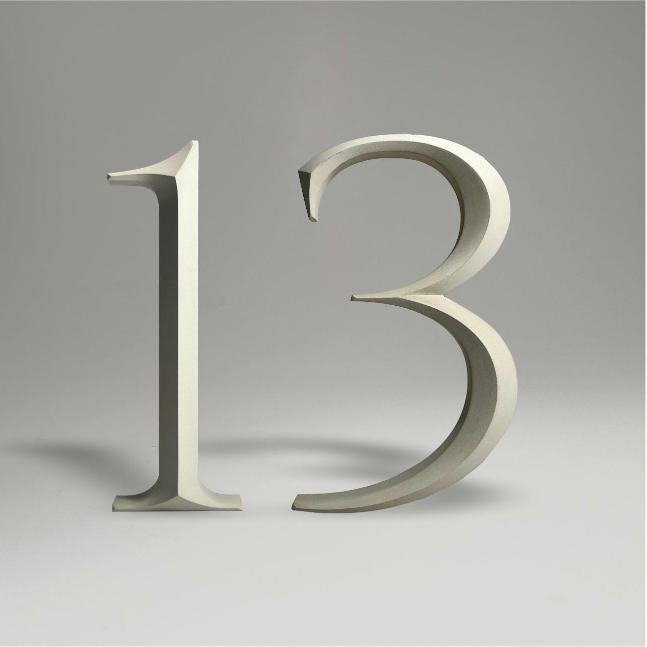 Floating prismatic house number ‘13’, crafted in an elegant design, perfect for modern homes and house signs.