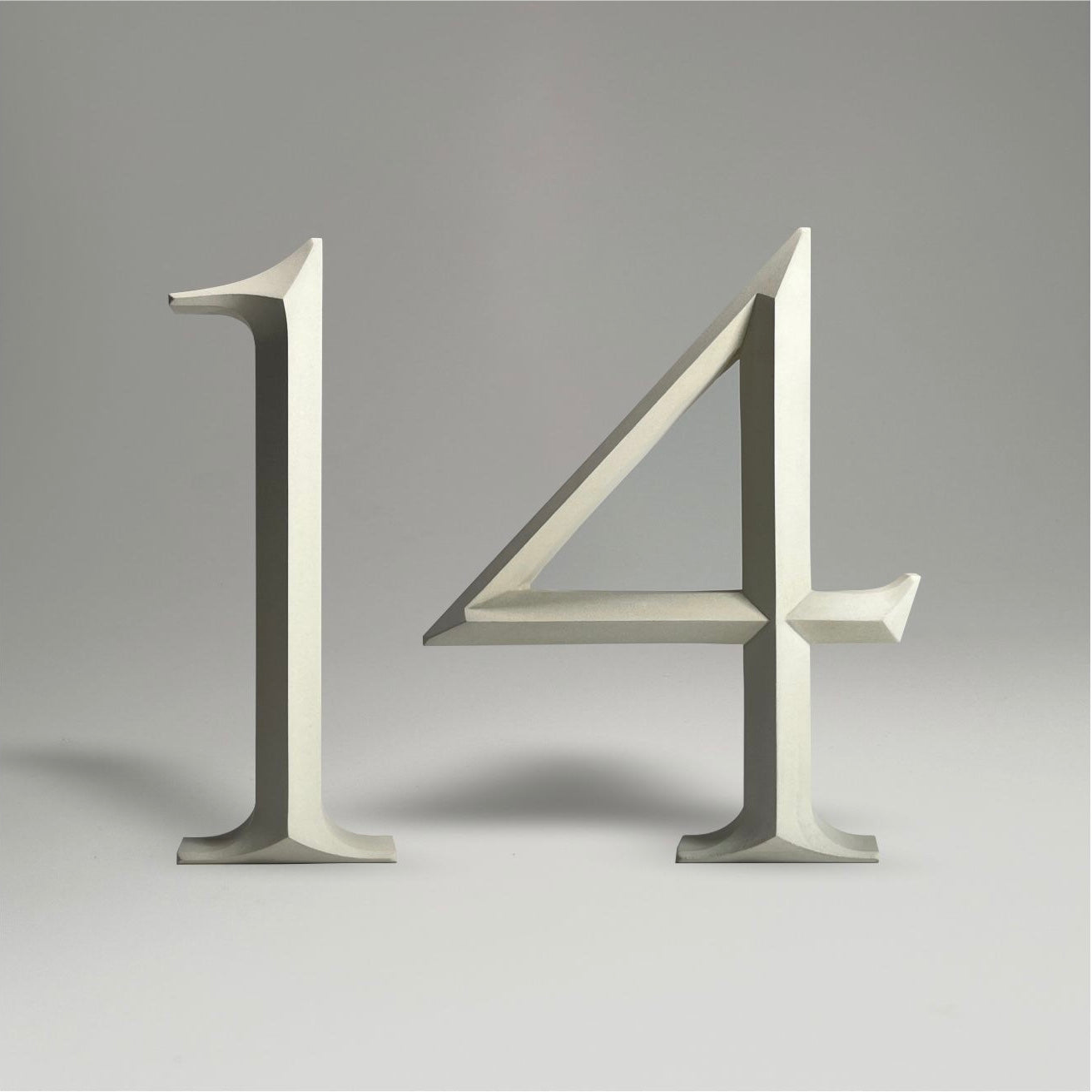 Elegant floating prismatic house number ‘14’, suitable for luxury homes and timeless architectural designs.