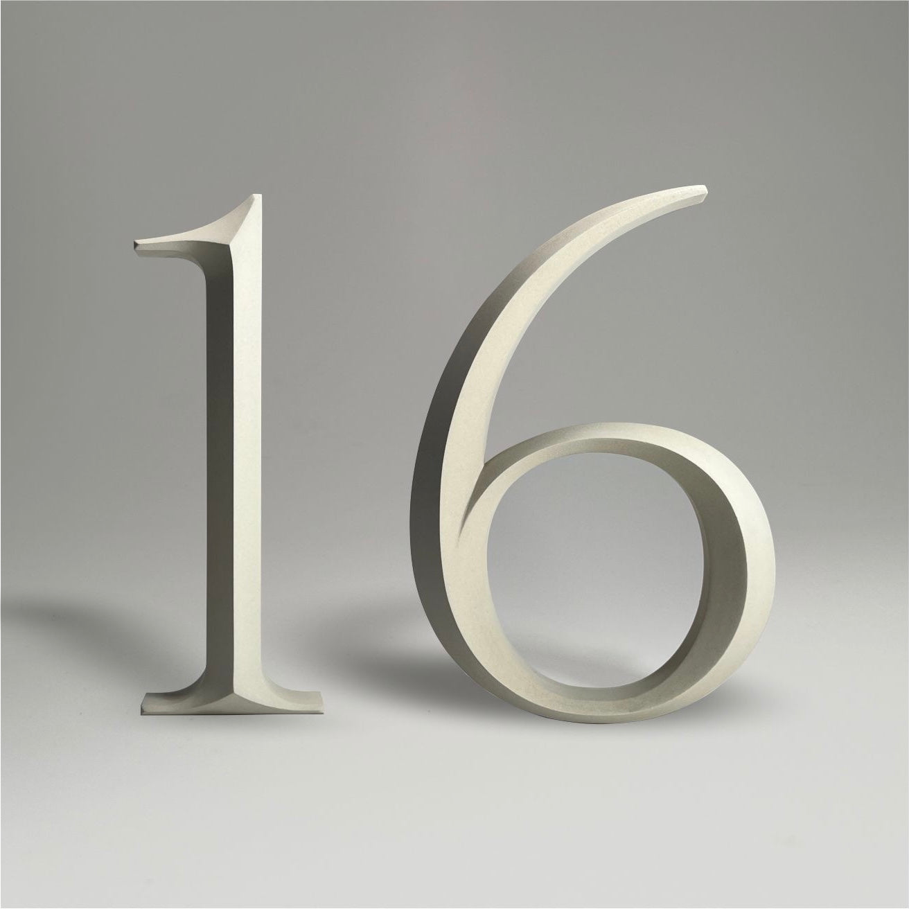 Floating prismatic house number ‘16’ with a sleek design, crafted for elegant homes and modern house signs.