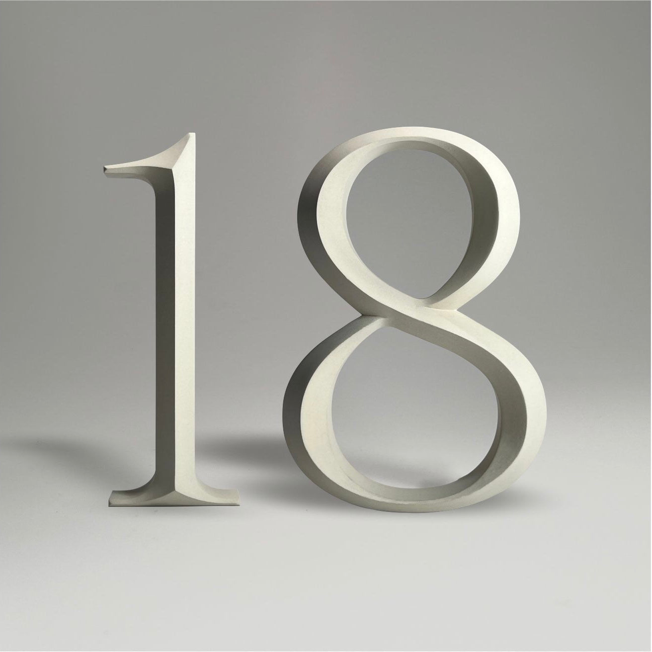 Floating prismatic house number ‘18’, crafted in an elegant design, perfect for modern homes and house signs.