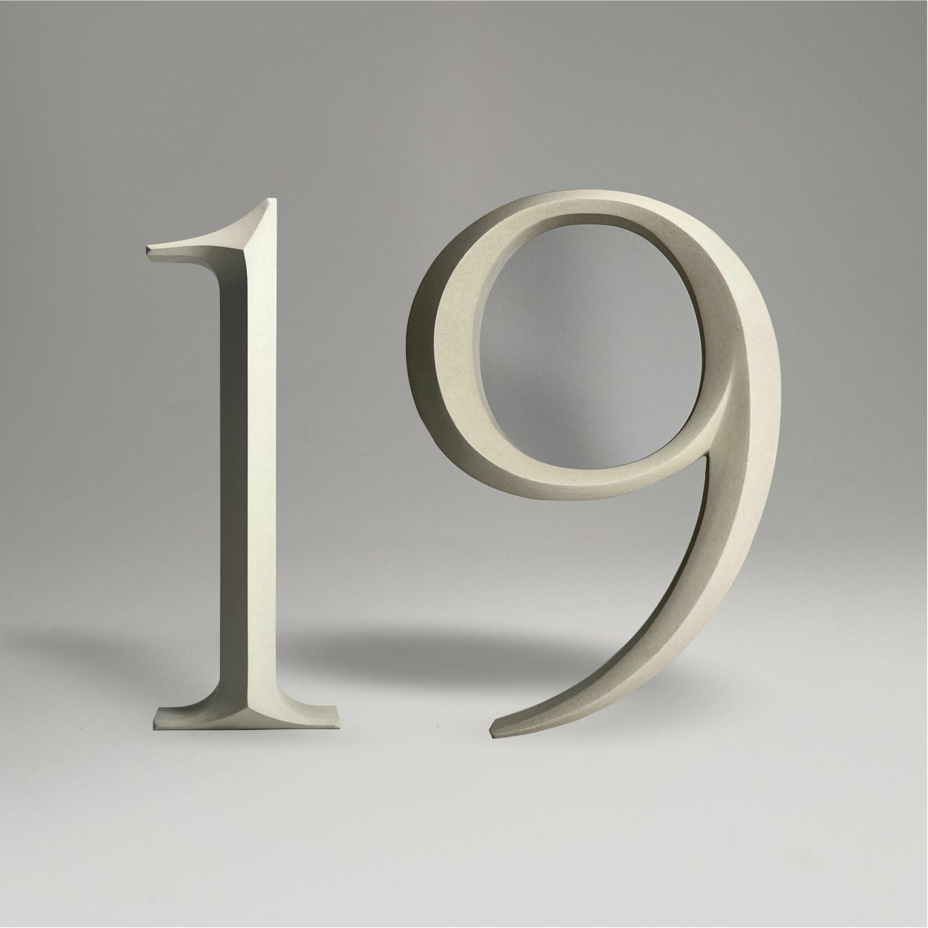 Elegant floating prismatic house number ‘19’, suitable for luxury homes and timeless architectural designs.