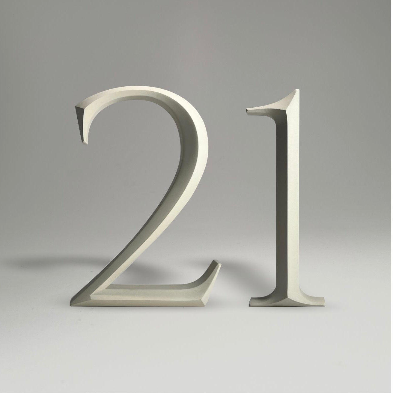 Floating prismatic house number ‘21’ with a sleek design, crafted for elegant homes and modern house signs.
