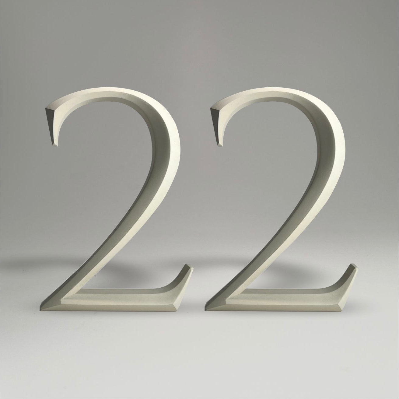 Luxury floating prismatic house number sign ‘22’, ideal for classical houses with timeless appeal.