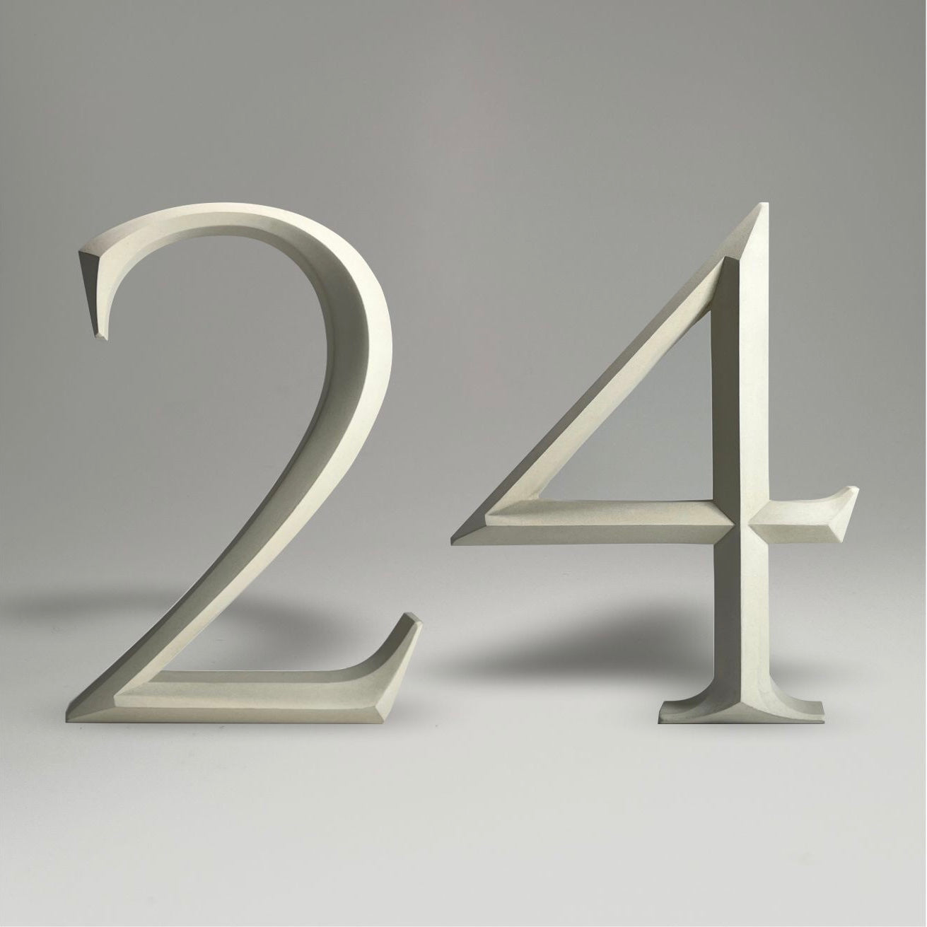 Elegant floating prismatic house number ‘24’, suitable for luxury homes and timeless architectural designs.