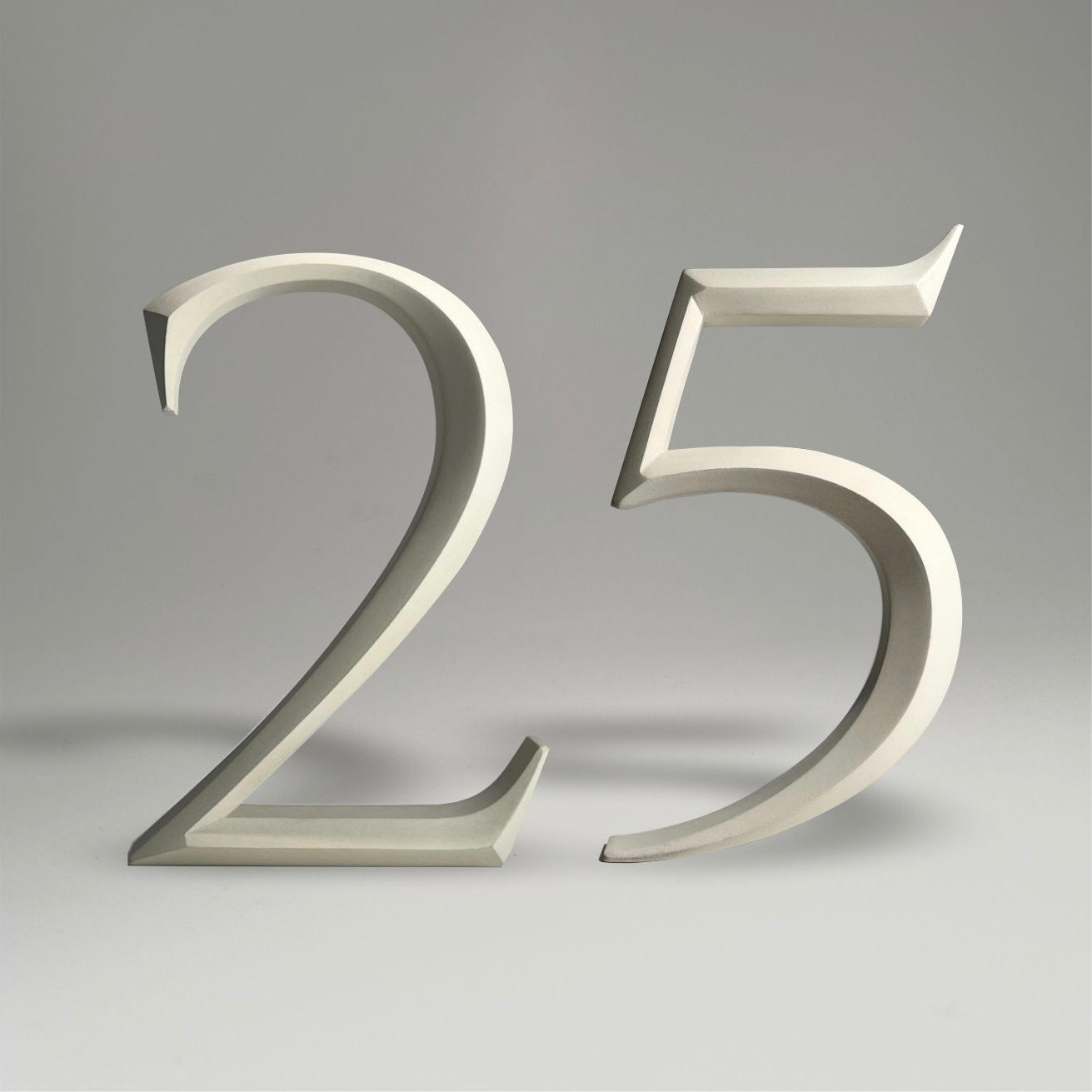 Luxury house number ‘25’, with a floating prismatic design for modern and classical homes alike.