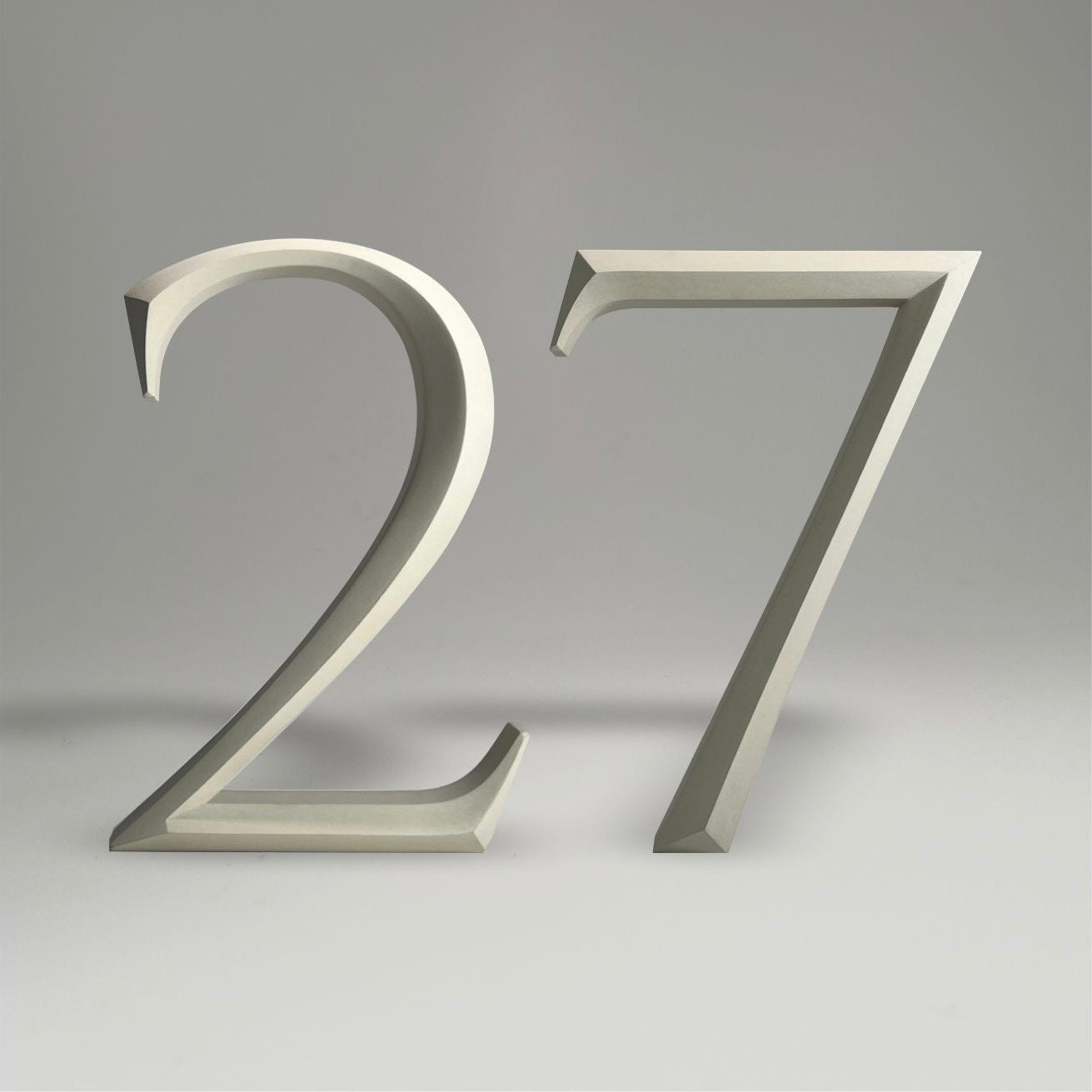 Luxury floating prismatic house number sign ‘27’, ideal for classical houses with timeless appeal.
