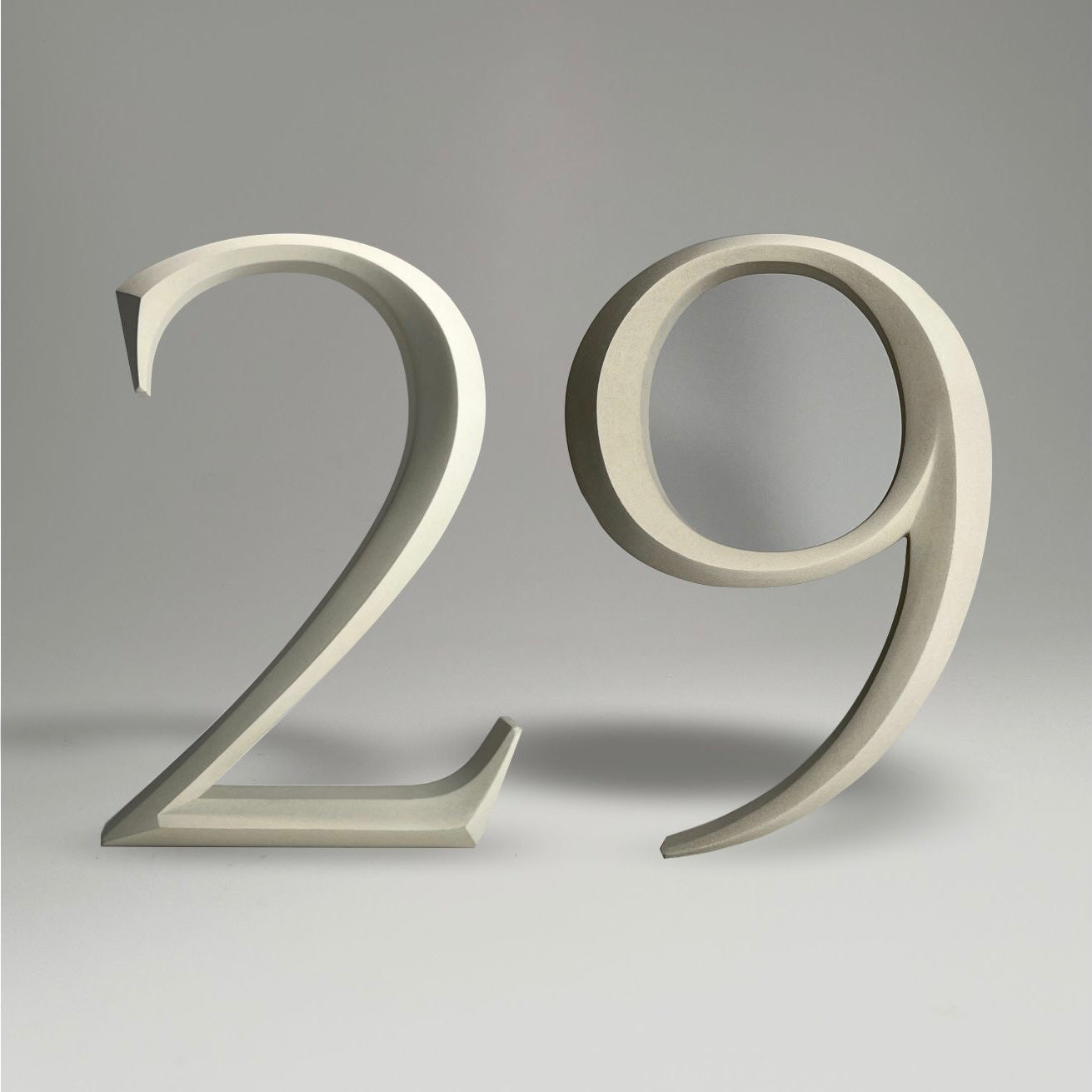 Elegant floating prismatic house number ‘29’, suitable for luxury homes and timeless architectural designs.