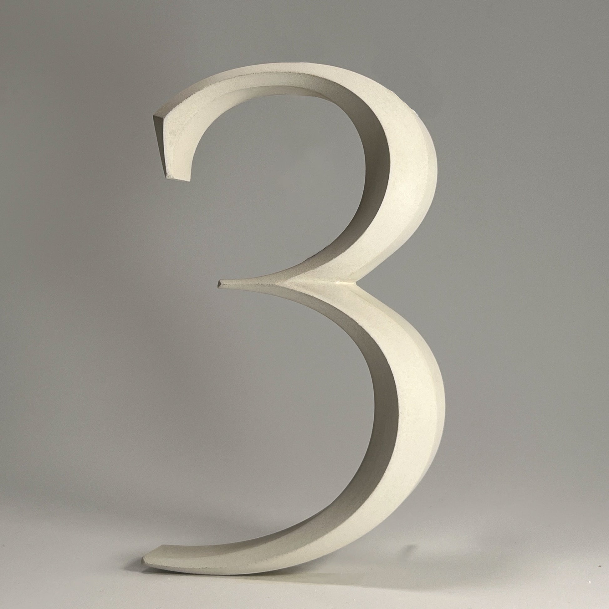 Luxury house number ‘3’, with a floating prismatic design for modern and classical homes alike.