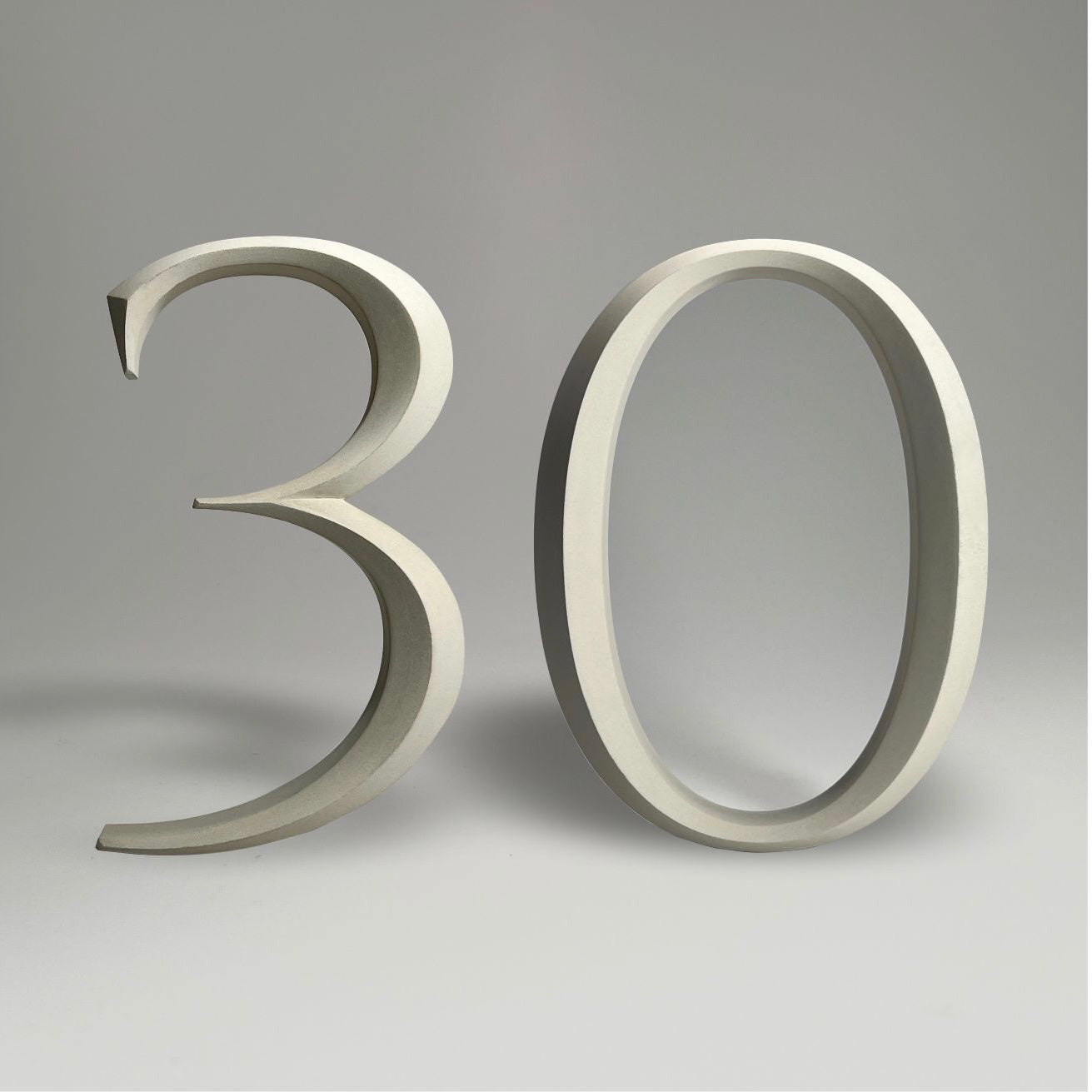 Luxury house number ‘30’, with a floating prismatic design for modern and classical homes alike.