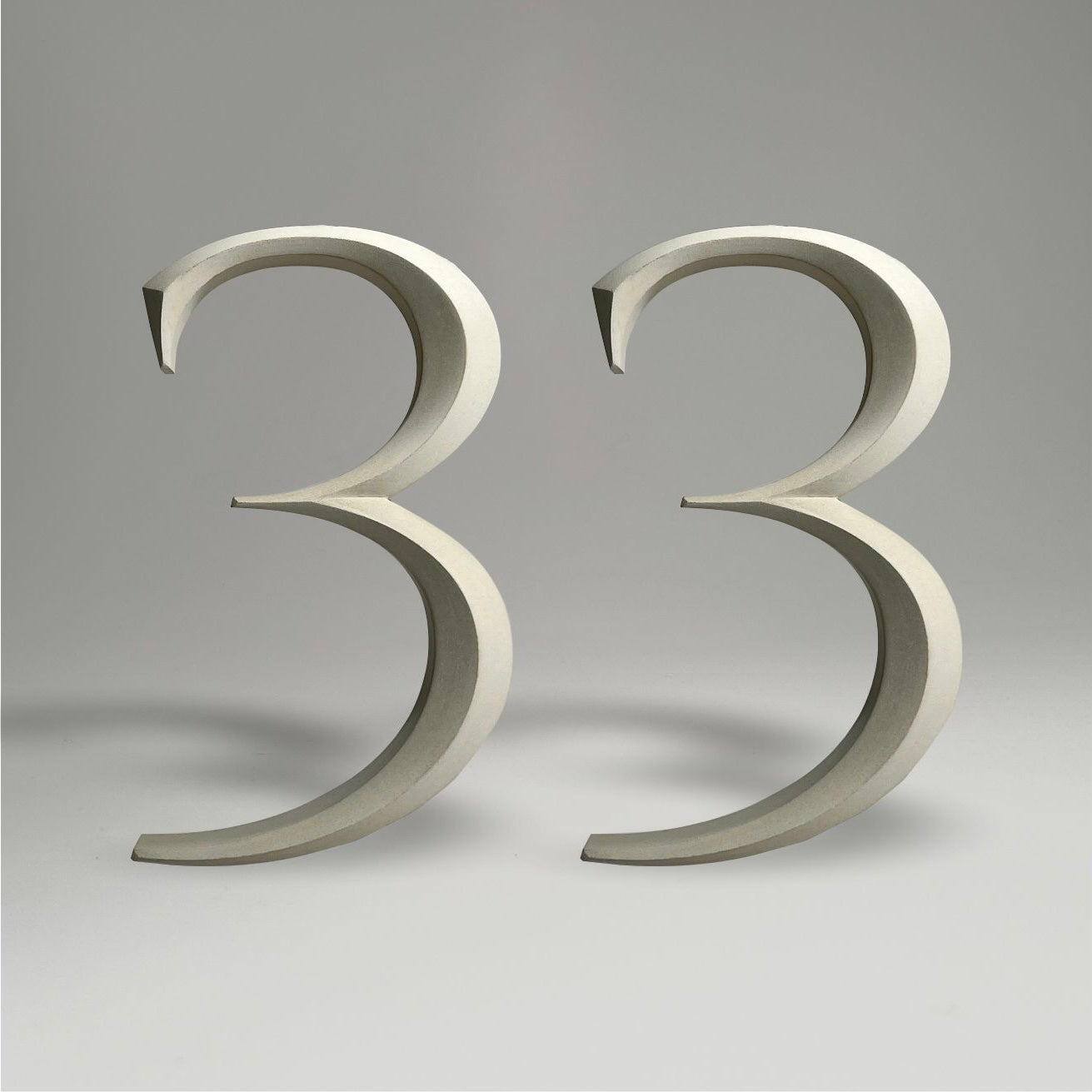Floating prismatic house number ‘33’, crafted in an elegant design, perfect for modern homes and house signs.