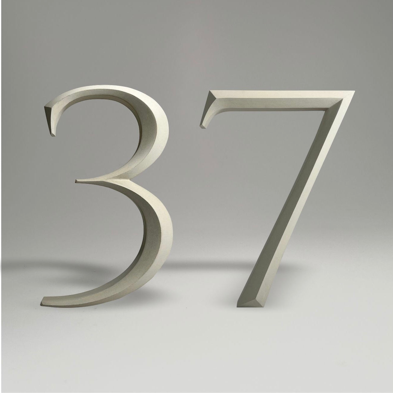 Luxury floating prismatic house number sign ‘37’, ideal for classical houses with timeless appeal.