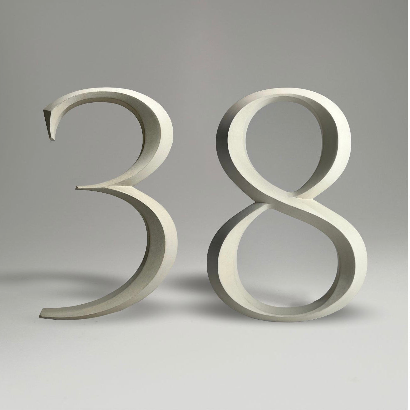 Floating prismatic house number ‘38’, crafted in an elegant design, perfect for modern homes and house signs.