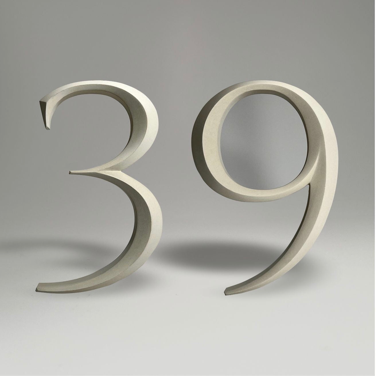 Elegant floating prismatic house number ‘39’, suitable for luxury homes and timeless architectural designs.