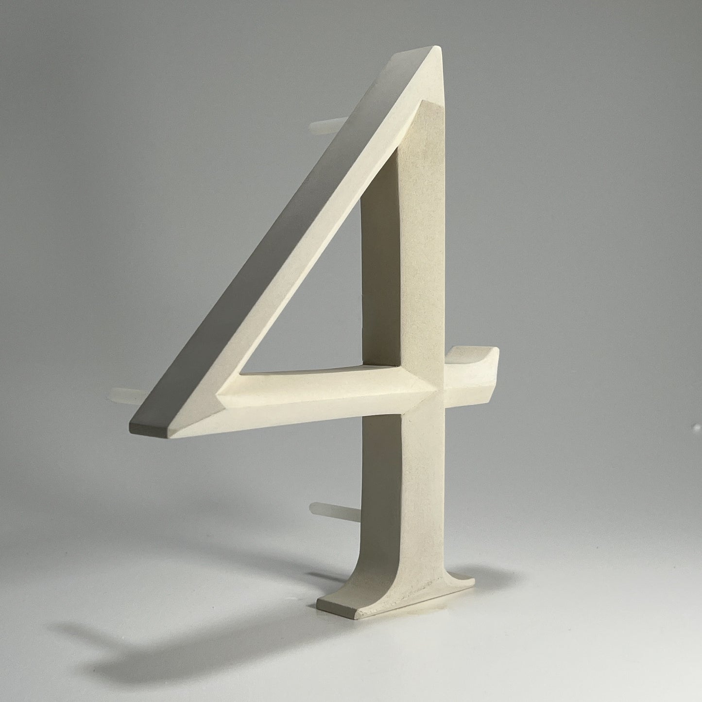 Floating prismatic house number ‘4’, crafted in an elegant design, perfect for modern homes and house signs.