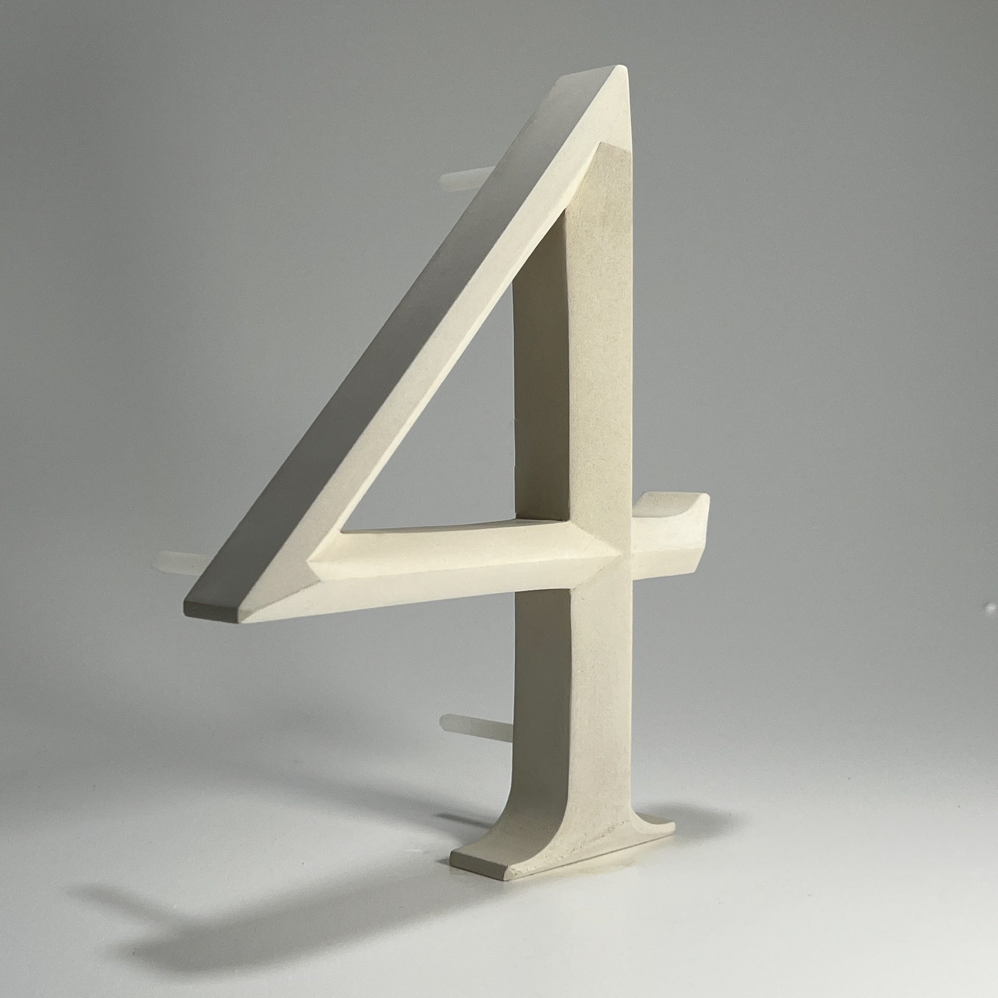Floating prismatic house number ‘4’, crafted in an elegant design, perfect for modern homes and house signs.
