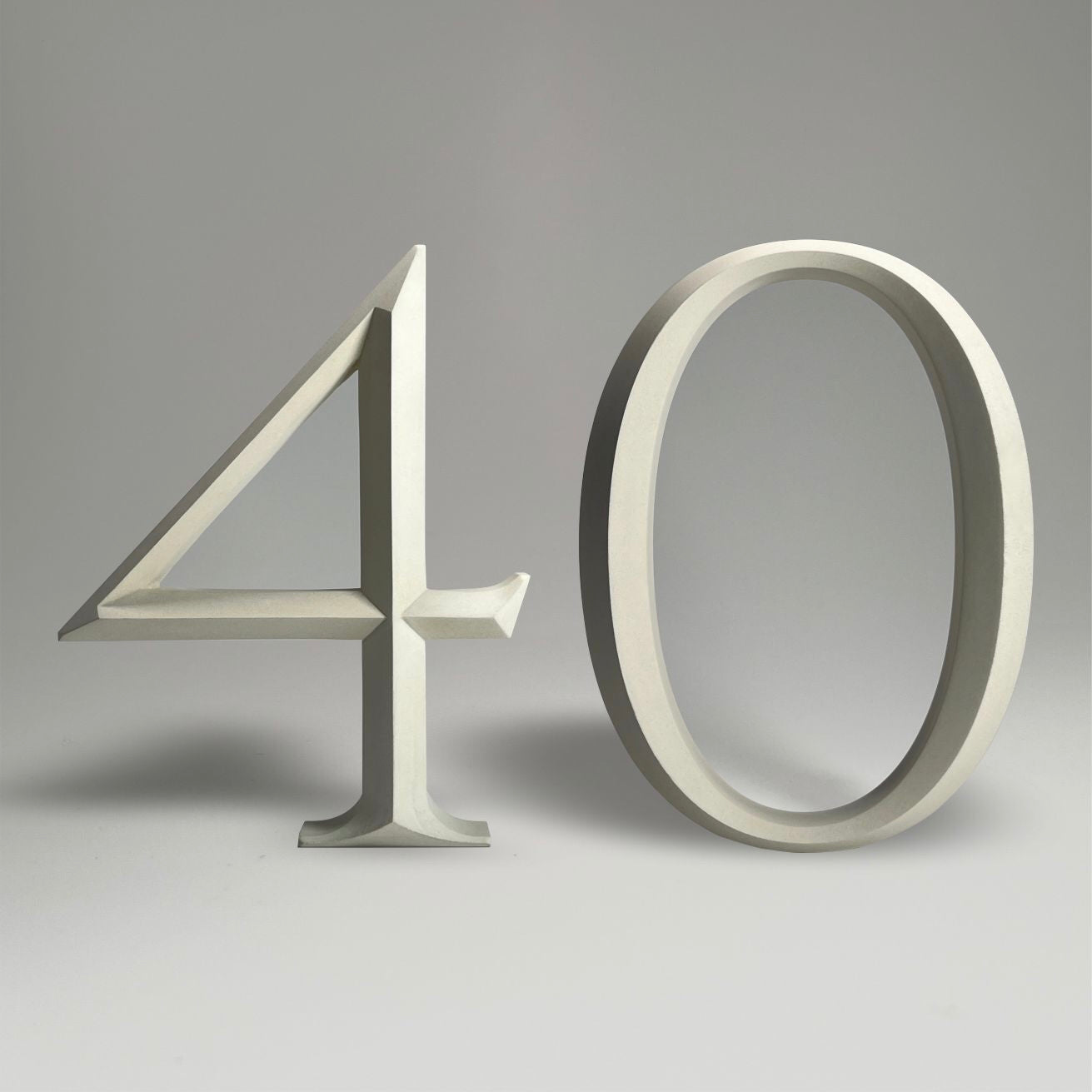 Luxury house number ‘40’, with a floating prismatic design for modern and classical homes alike.