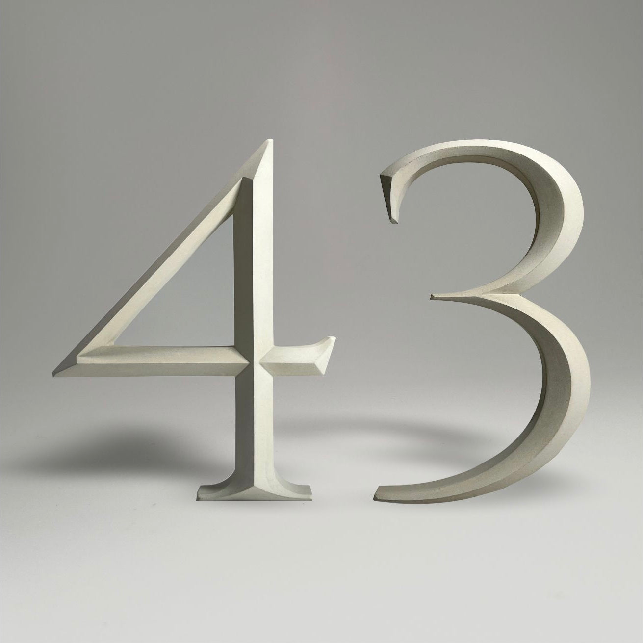 Floating prismatic house number ‘43’, crafted in an elegant design, perfect for modern homes and house signs.