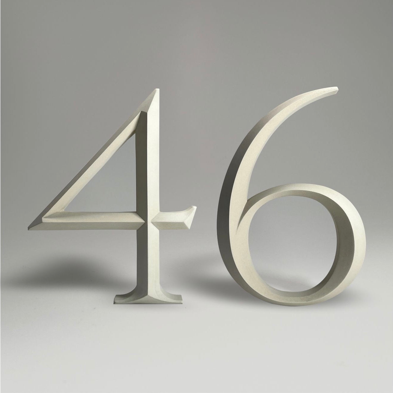 Floating prismatic house number ‘46’ with a sleek design, crafted for elegant homes and modern house signs.