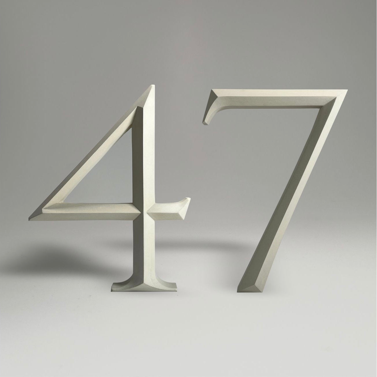 Luxury floating prismatic house number sign ‘47’, ideal for classical houses with timeless appeal.