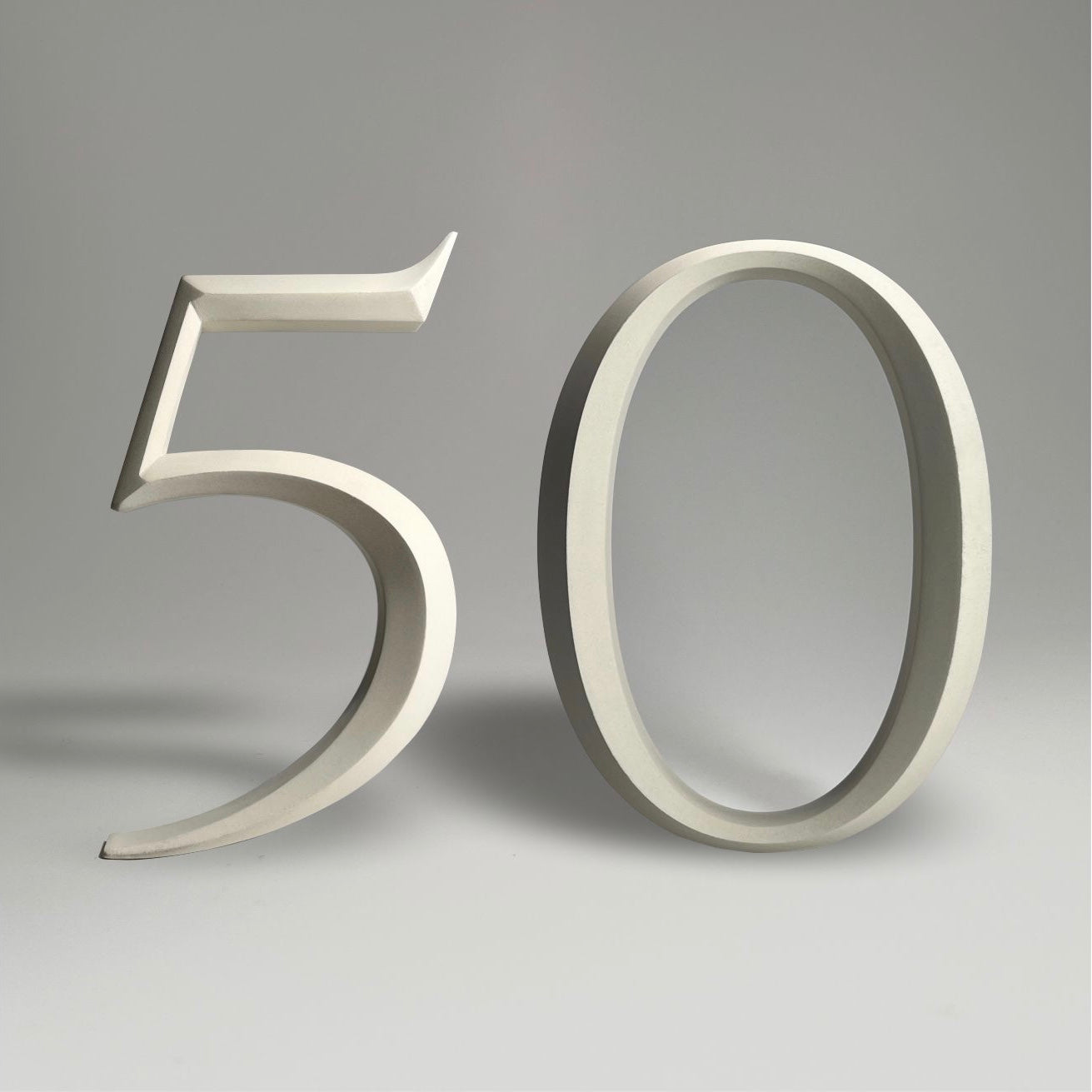 Luxury house number ‘50’, with a floating prismatic design for modern and classical homes alike.