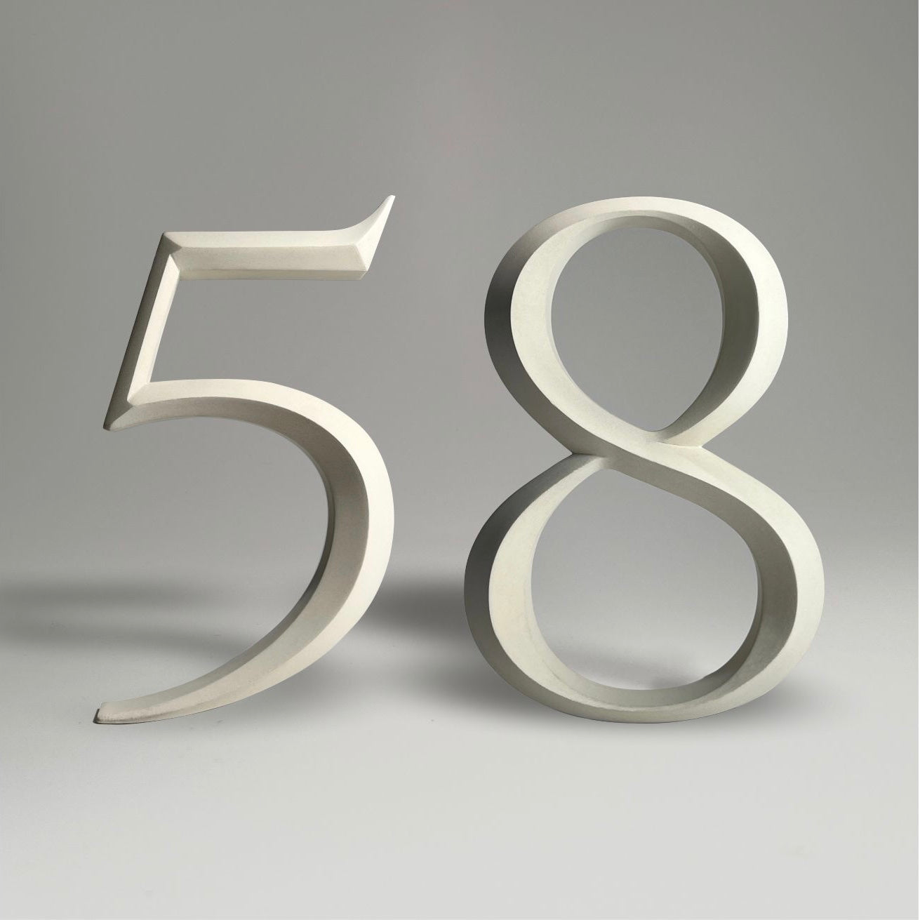Floating prismatic house number ‘58’, crafted in an elegant design, perfect for modern homes and house signs.
