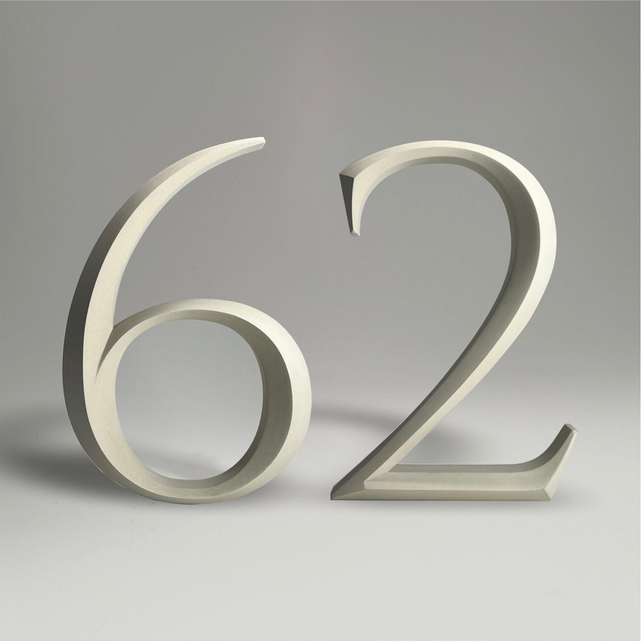 Luxury floating prismatic house number sign ‘62’, ideal for classical houses with timeless appeal.
