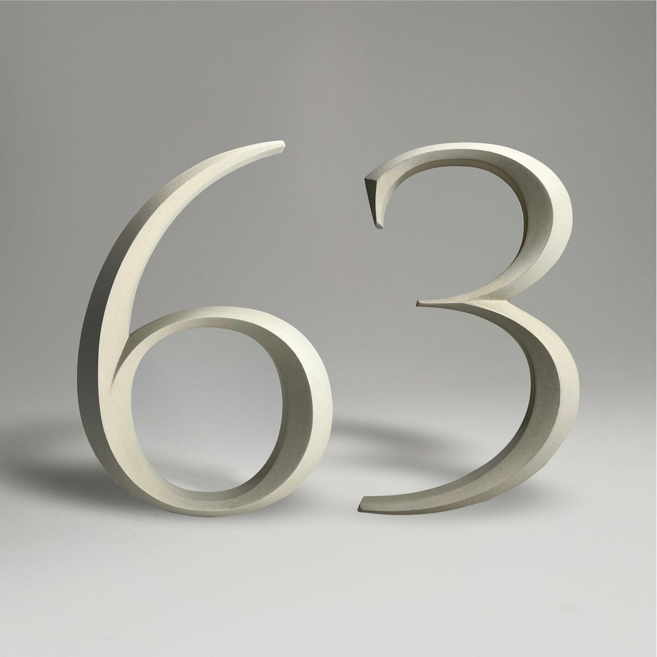 Floating prismatic house number ‘63’, crafted in an elegant design, perfect for modern homes and house signs.