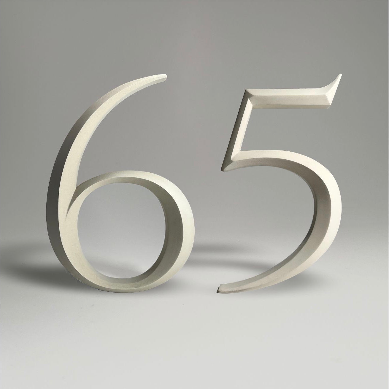 Luxury house number ‘65’, with a floating prismatic design for modern and classical homes alike.