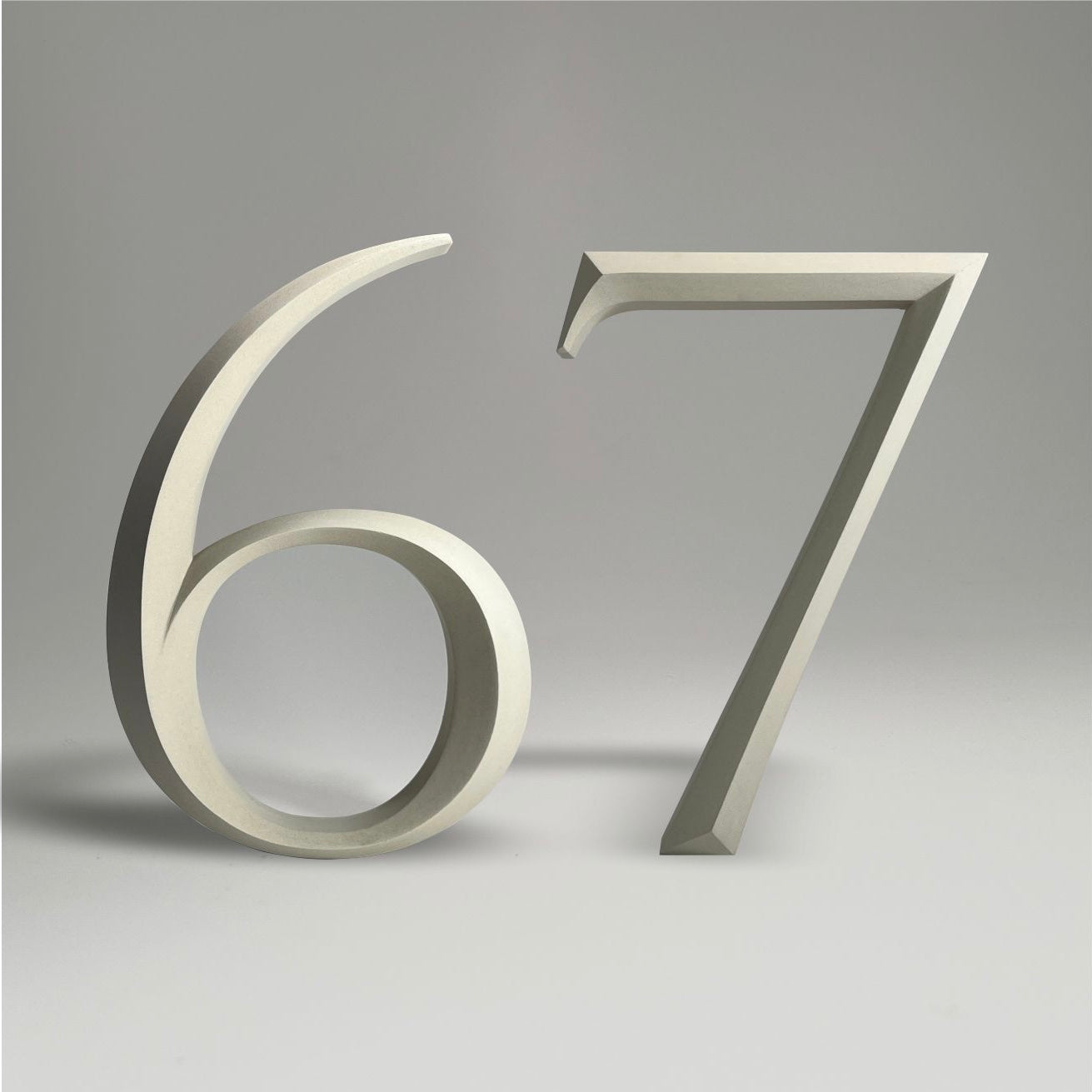 Luxury floating prismatic house number sign ‘67’, ideal for classical houses with timeless appeal.