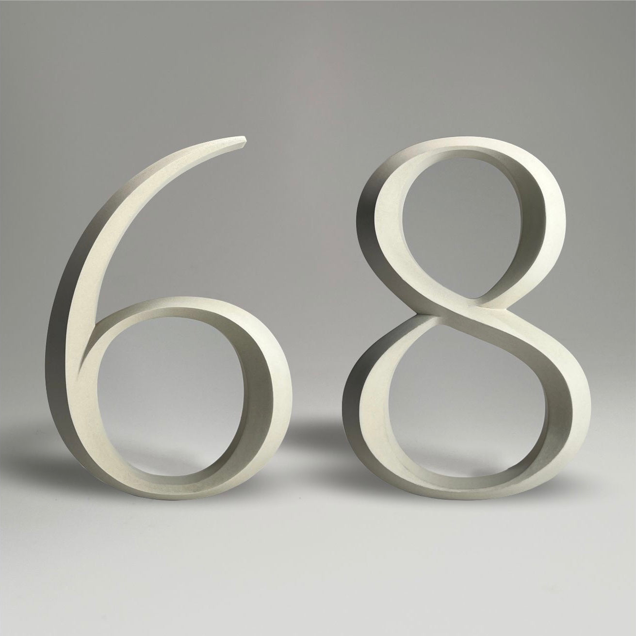 Floating prismatic house number ‘68’, crafted in an elegant design, perfect for modern homes and house signs.