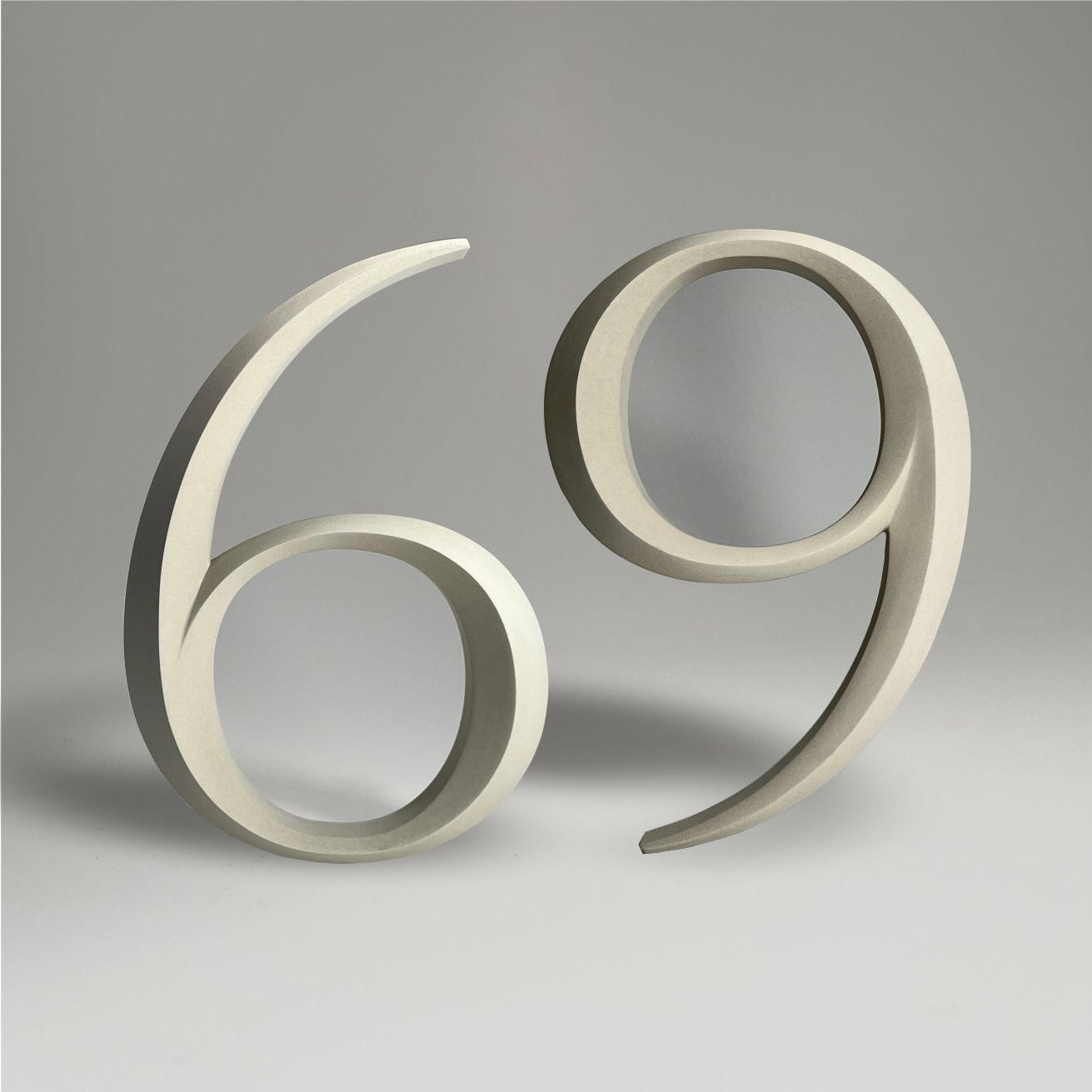 Elegant floating prismatic house number ‘69’, suitable for luxury homes and timeless architectural designs.