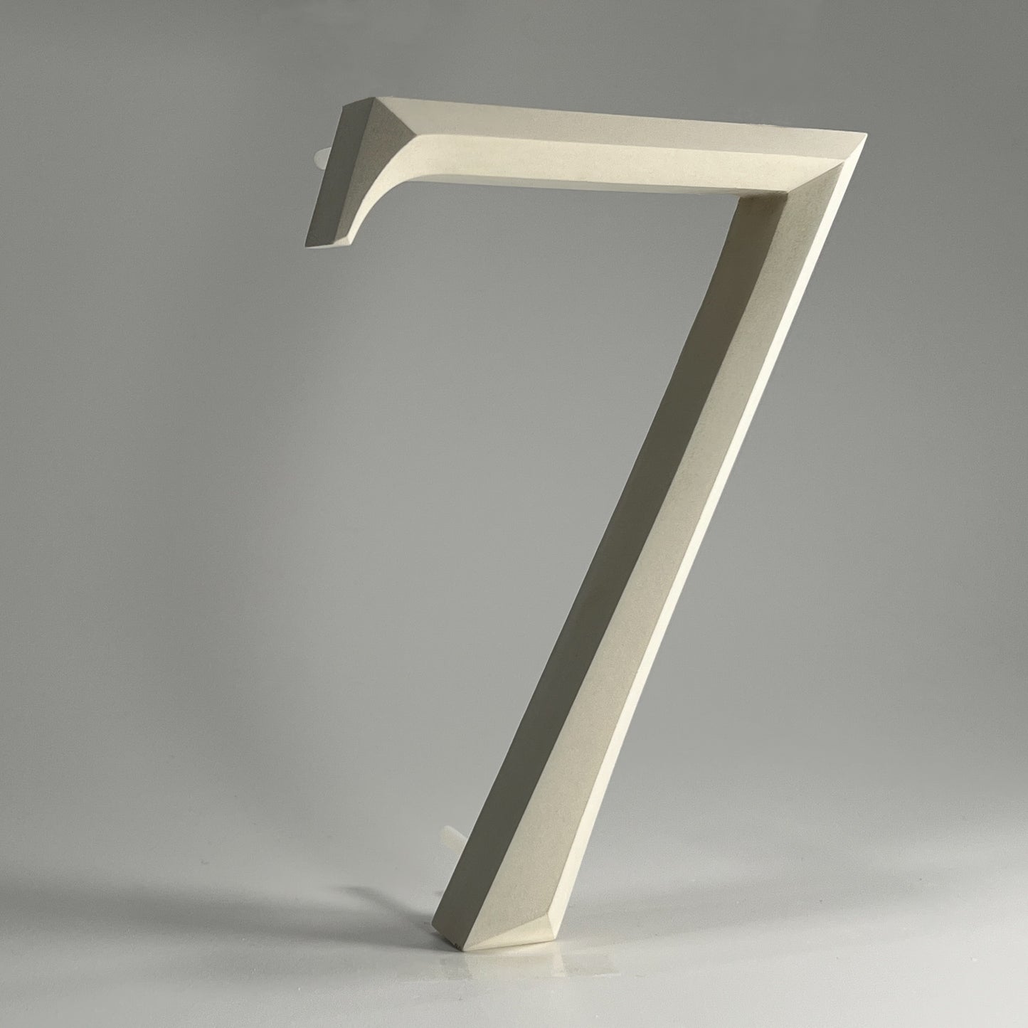 Luxury house number ‘7’, with a floating prismatic design for modern and classical homes alike.