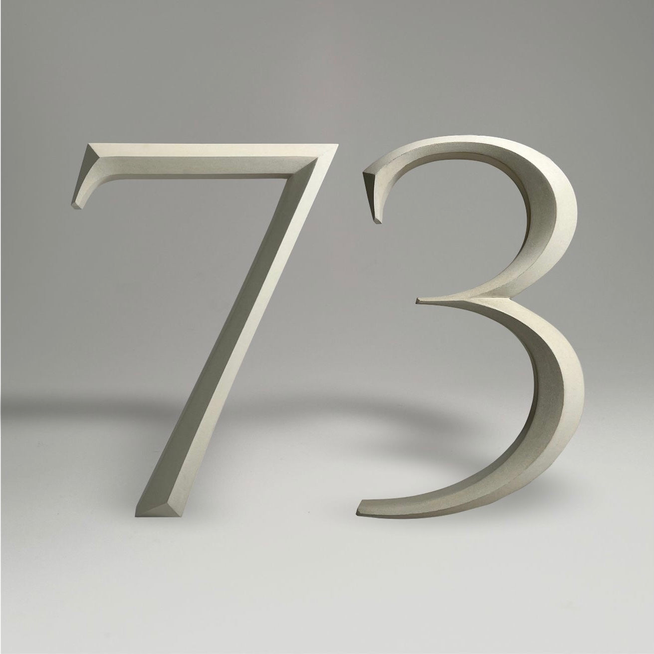 Floating prismatic house number ‘73’, crafted in an elegant design, perfect for modern homes and house signs.