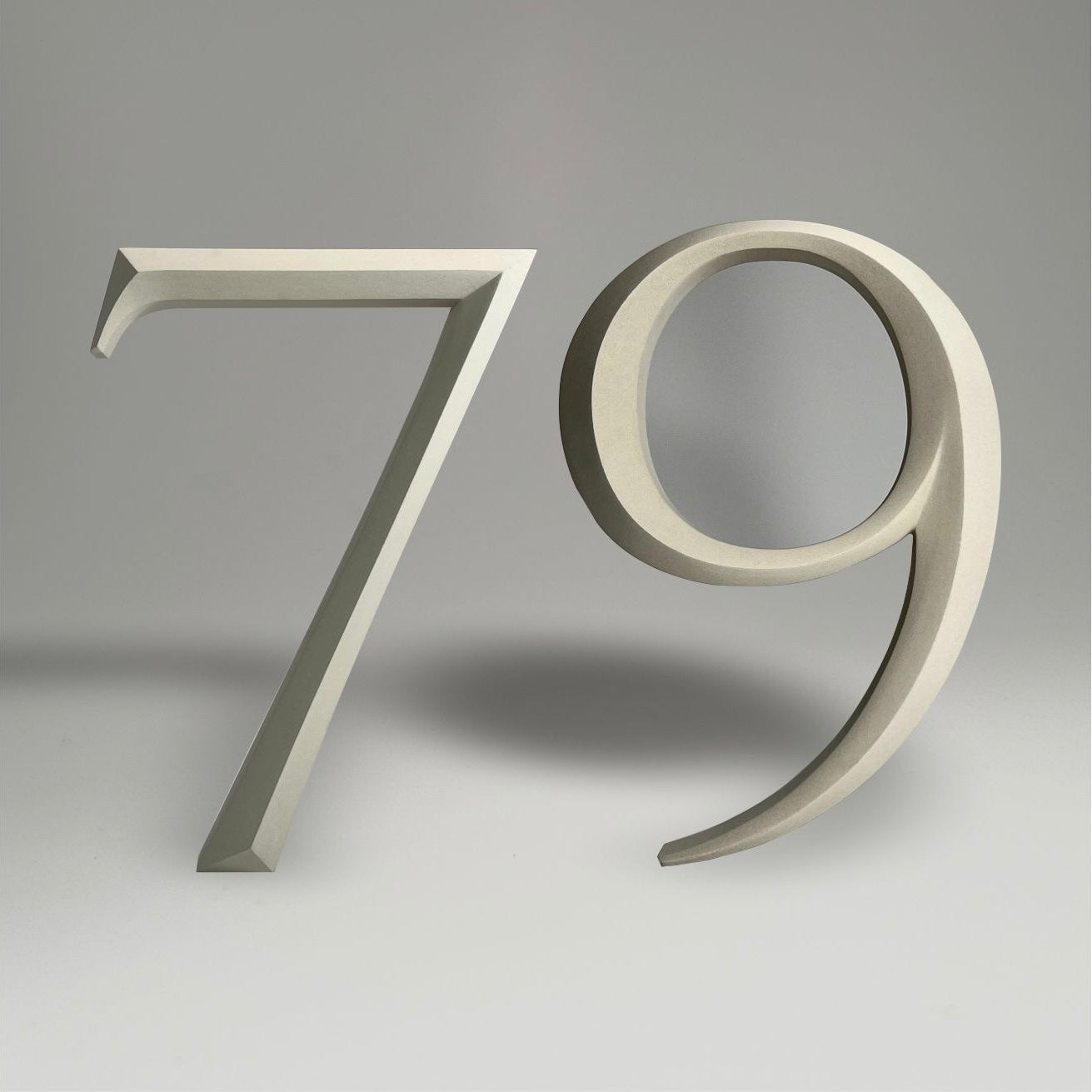 Elegant floating prismatic house number ‘79’, suitable for luxury homes and timeless architectural designs.