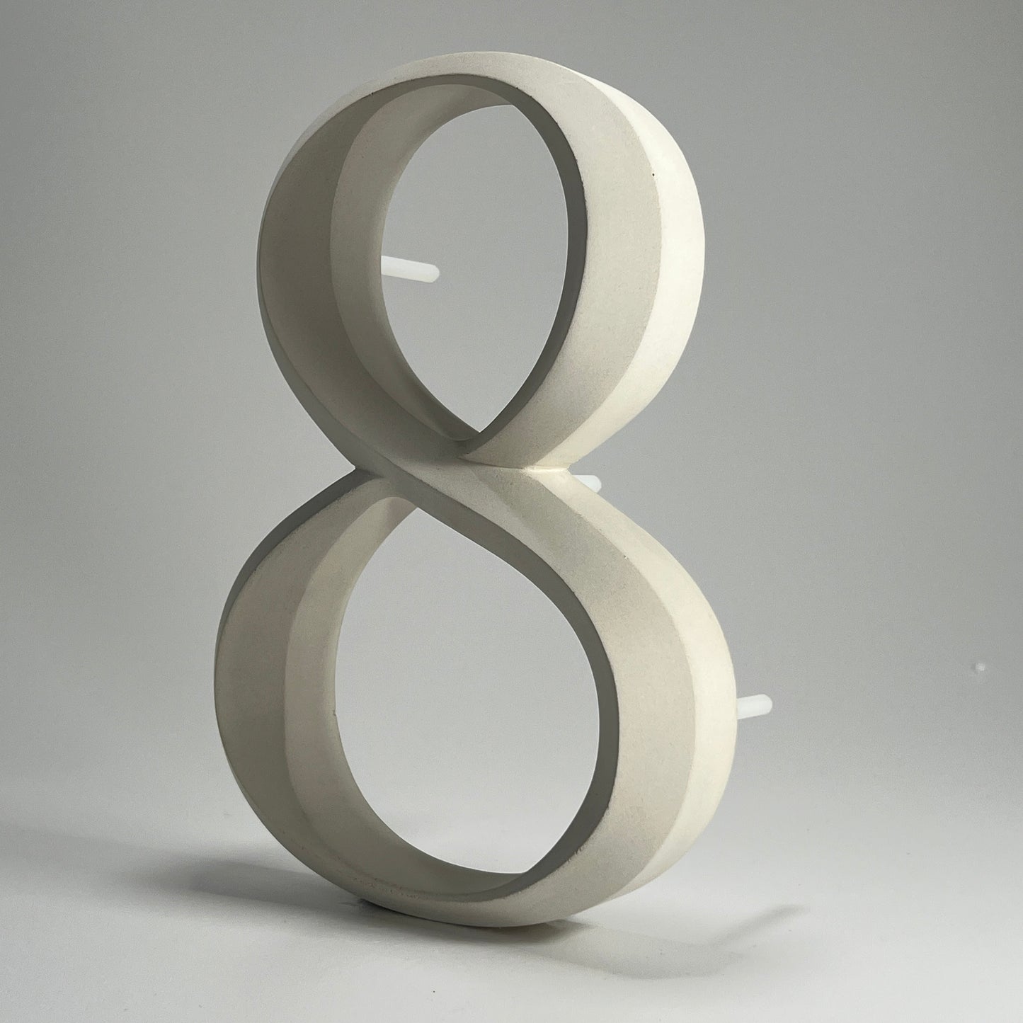 Luxury house number ‘8’, with a floating prismatic design for modern and classical homes alike.