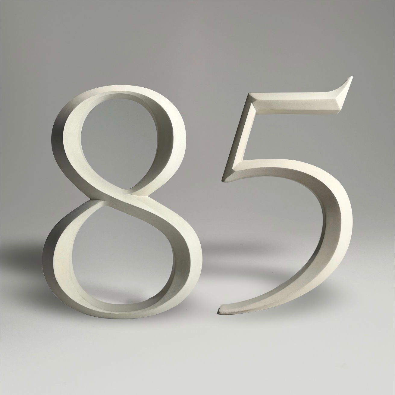 Luxury house number ‘85’, with a floating prismatic design for modern and classical homes alike.