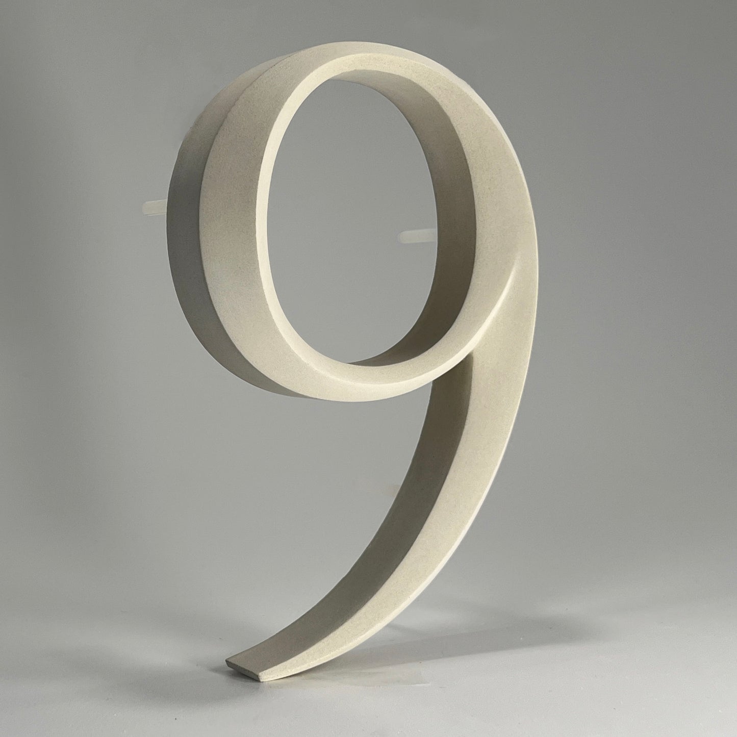 Luxury house number ‘9', with a floating prismatic design for modern and classical homes alike.