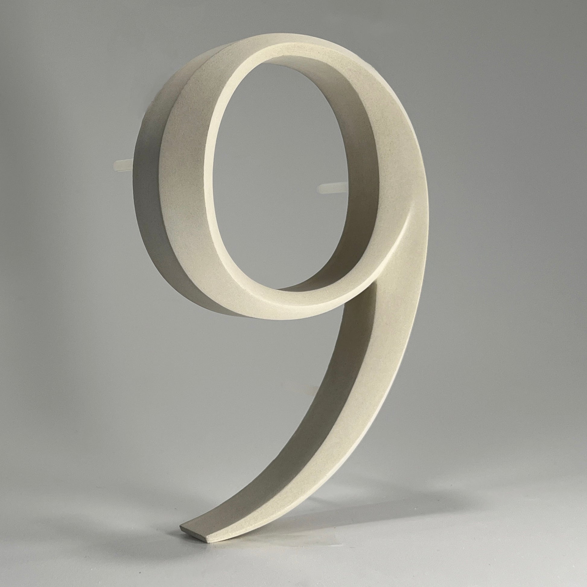 Luxury house number ‘9', with a floating prismatic design for modern and classical homes alike.