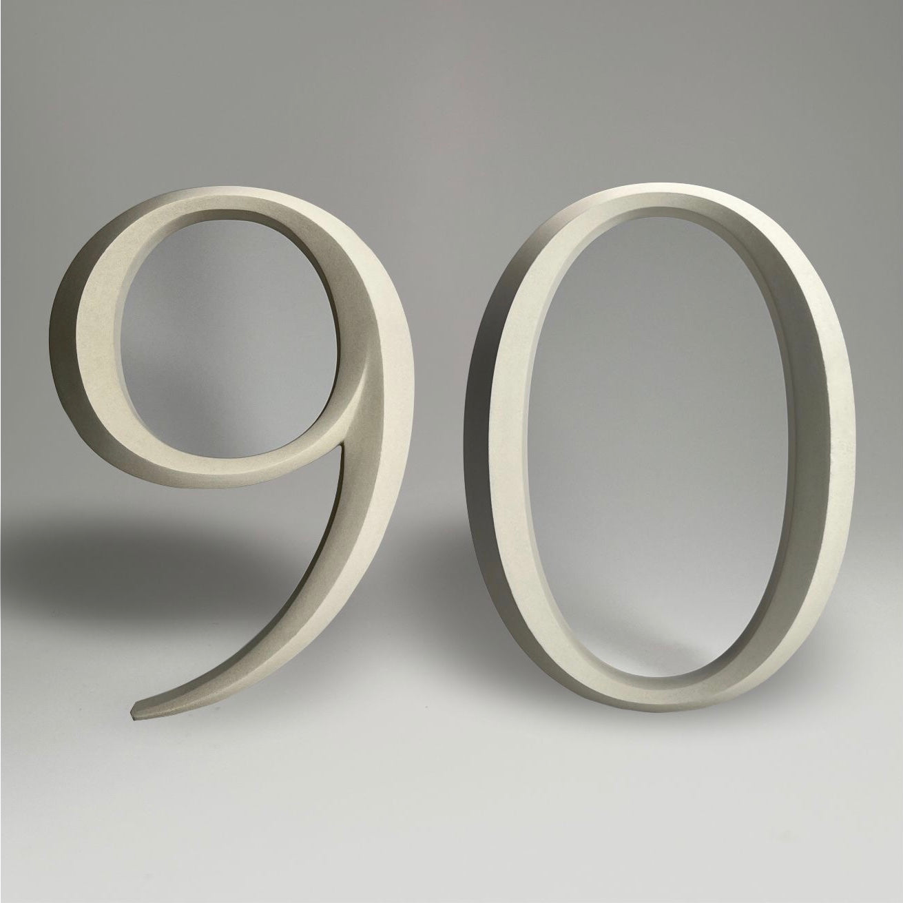 Luxury house number ‘90’, with a floating prismatic design for modern and classical homes alike.