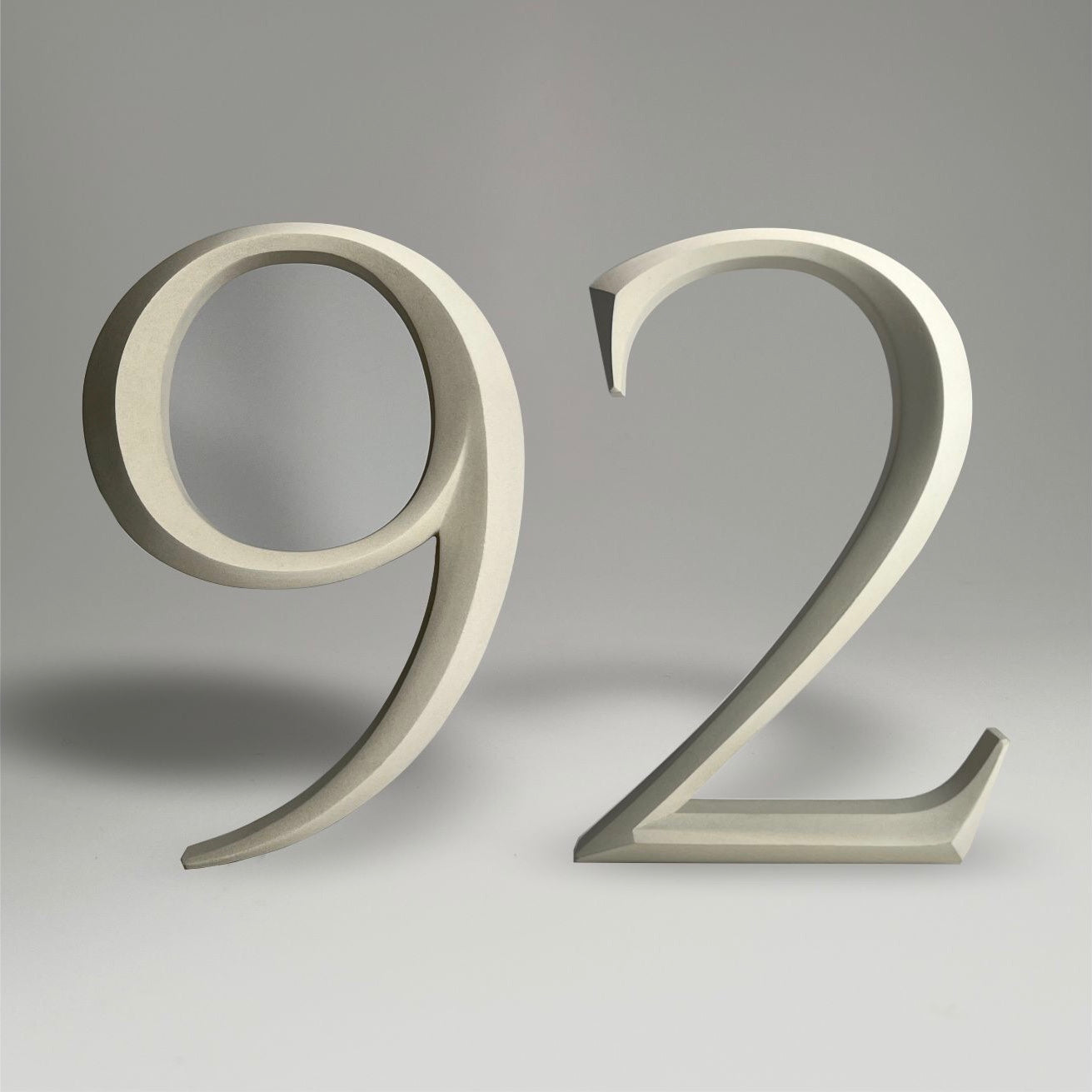 Luxury floating prismatic house number sign ‘92’, ideal for classical houses with timeless appeal.