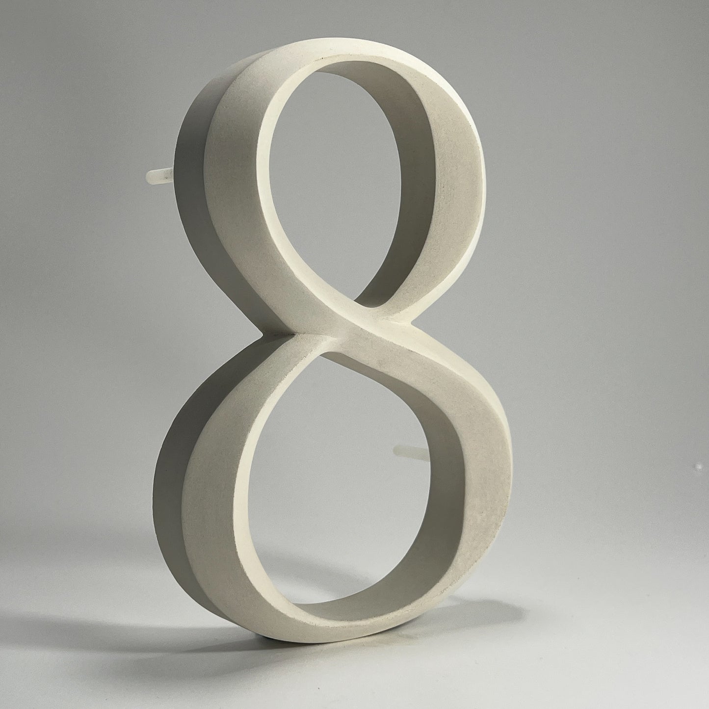 Floating prismatic house number ‘8’, crafted in an elegant design, perfect for modern homes and house signs.